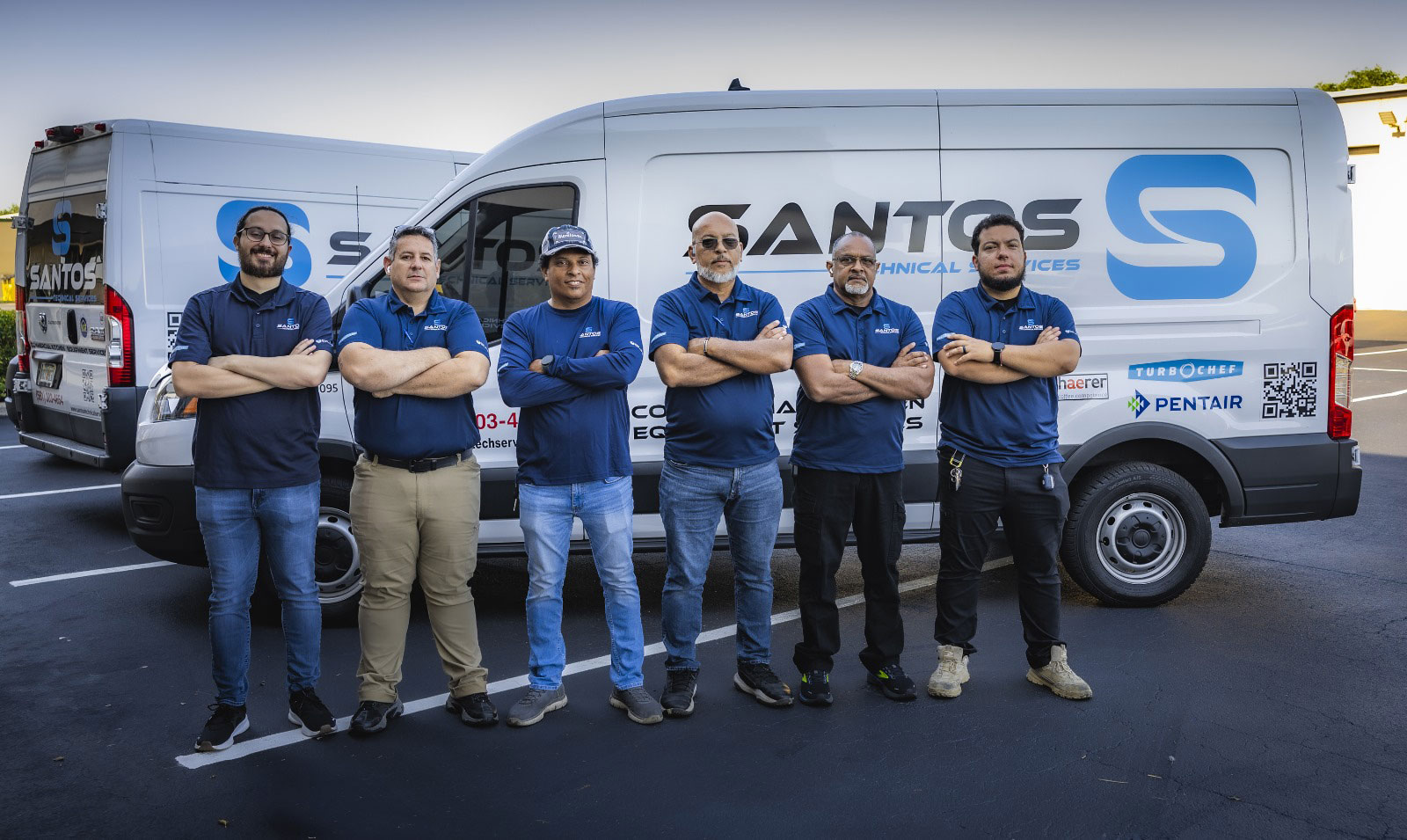 Santos Technical Services technicians in a training lab, enhancing skills in commercial kitchen maintenance and repair, specializing in coffee machines, refrigeration systems, and ice equipment. Expert team serving businesses in Boca Raton, Florida.